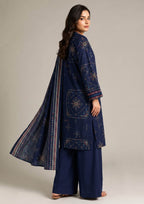 Seated view of Navy Heritage stitched printed lawn suit with premium Cambric Lawn fabric, coordinated dupatta and relaxed straight fit by Mirasl.