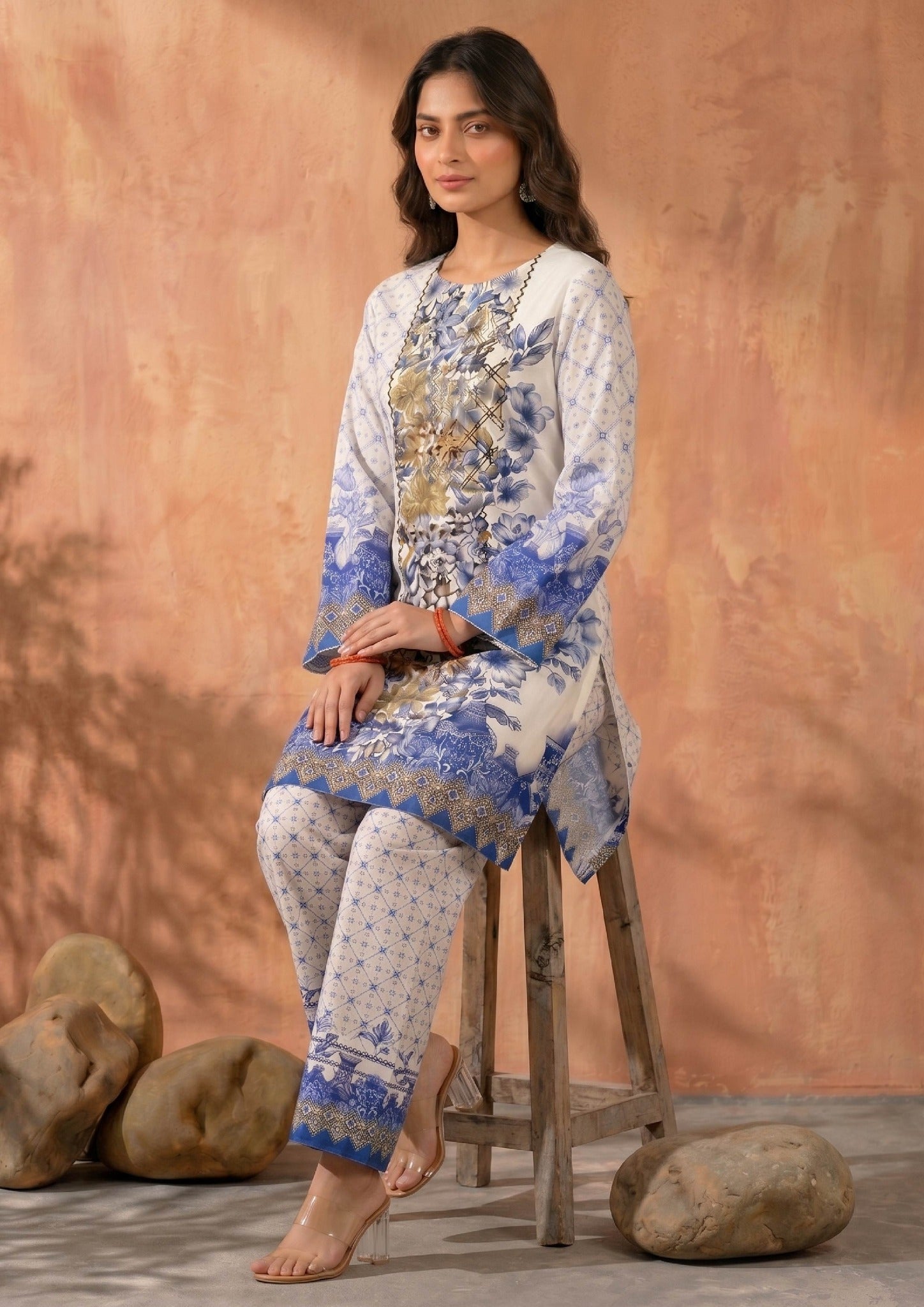 Front view of Mirasl Ornate Ocean 2 piece co-ord set featuring an ivory printed lawn knee-level shirt, blue ornate floral artwork, and matching printed straight trouser.