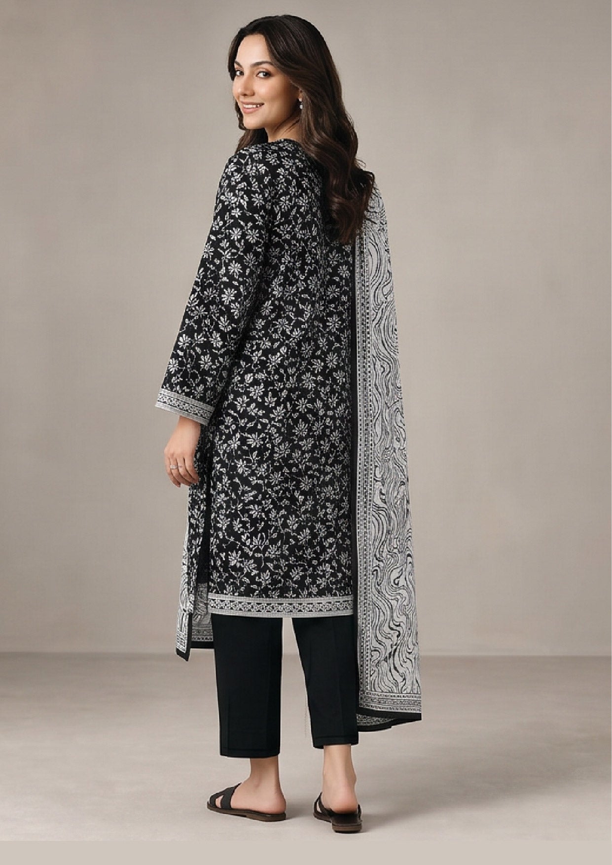 Pakistani black lawn suit by Mirasl with printed ivory dupatta, straight trouser and elegant monochrome ready to wear look
