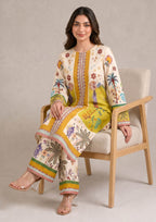 Side view of Mirasl Palm Grove printed lawn co-ord set showing knee-level shirt, side slits, and printed straight trouser.