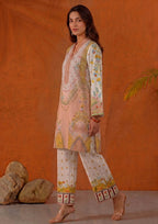 Side view of Mirasl Peach Blossom 2 piece co-ord set showing knee-level printed lawn shirt, side slits and matching printed straight trouser.
