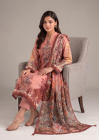 Seated view of Peach Flora 3 Piece Stitched Lawn Suit with coordinated dupatta by Mirasl