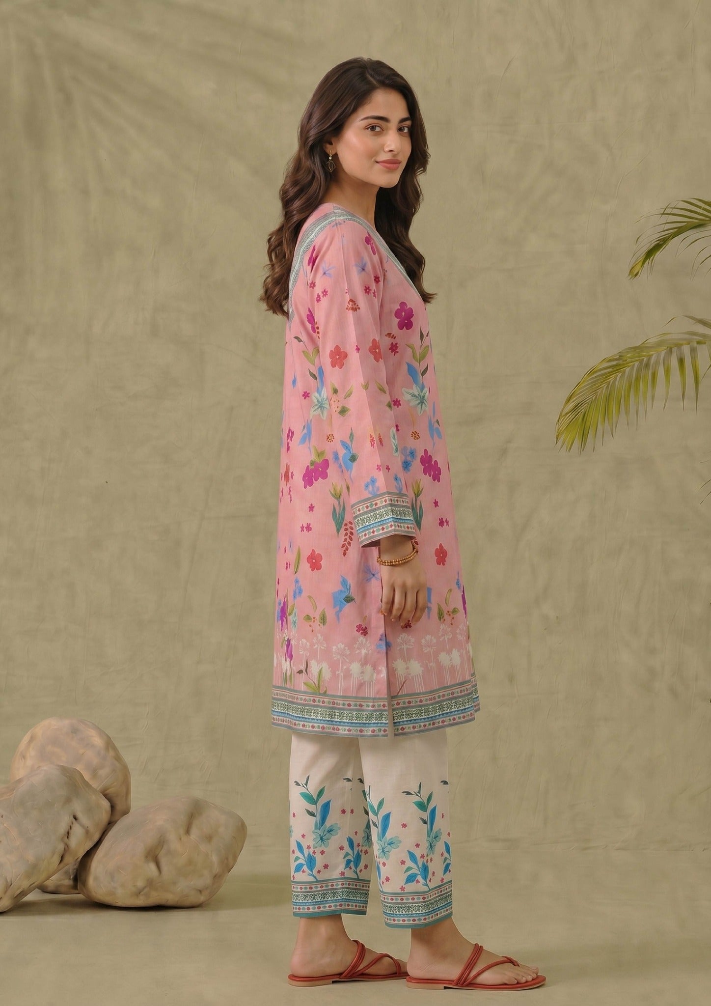 Front view of Mirasl Petal Pink 2 piece printed lawn co-ord set with soft pink floral shirt, V-neck border and white printed straight trouser.