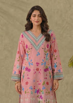 Walking view of Mirasl Petal Pink ready-to-wear printed lawn co-ord set with soft pink floral shirt and printed straight trouser.