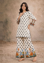 Petal Polka printed lawn co-ord showing relaxed SHIRT, statement sleeve detailing and matching wide-leg BOTTOM
