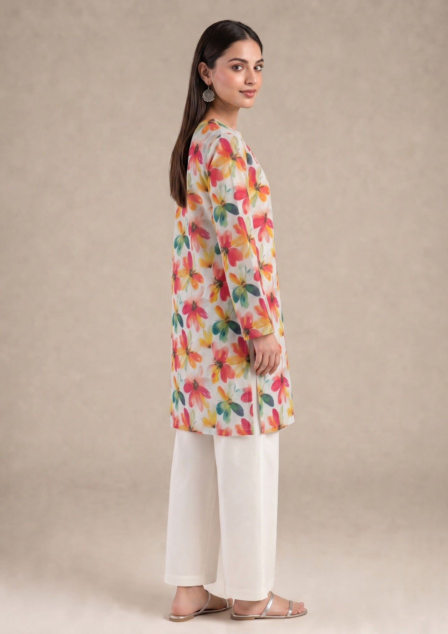 Front view of Petal Radiance 2 piece printed lawn co-ord set by Mirasl featuring a knee-level floral shirt, slit neckline, full sleeves, and white trouser.