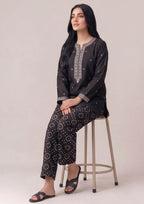 Printed black lawn trouser for Pakistani women by Mirasl with white chunri inspired motif detail
