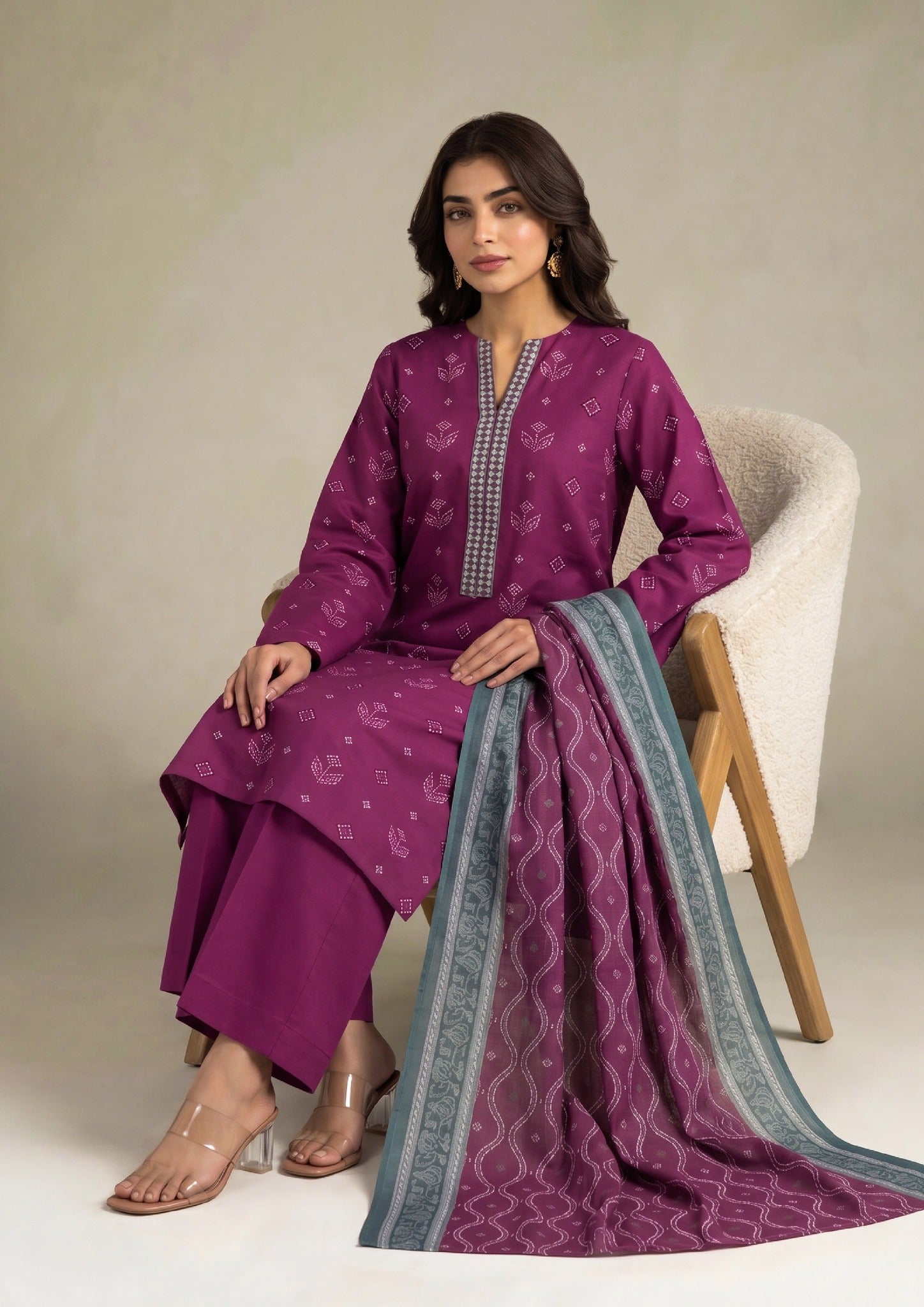 Walking view of Royal Orchid ready to wear lawn suit by Mirasl with orchid purple tones, teal bordered dupatta and premium Cambric Lawn fabric.
