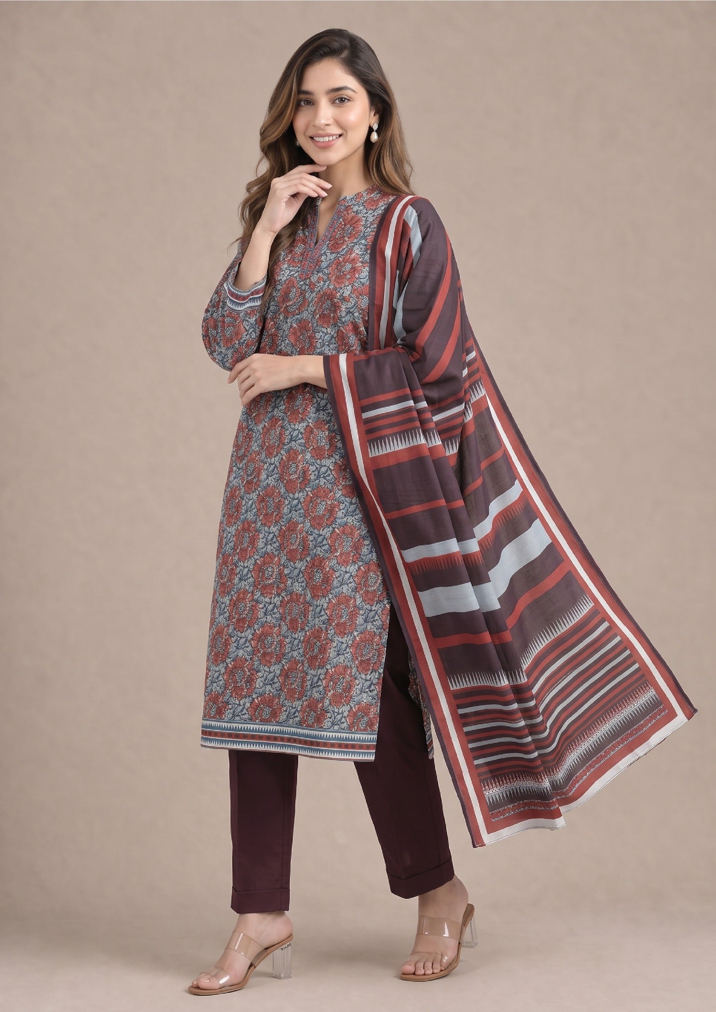 Elegant draped look of Rustic Garden Summer Lawn Suit by Mirasl.