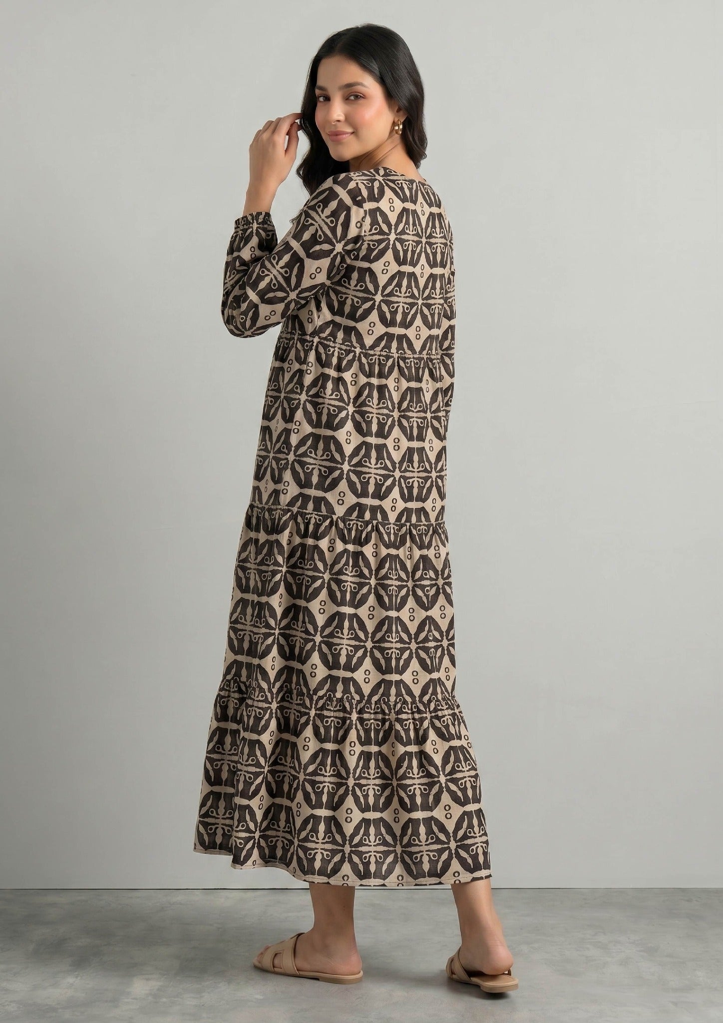 Sable Symphony printed lawn coord set side view with relaxed flared fit and geometric print