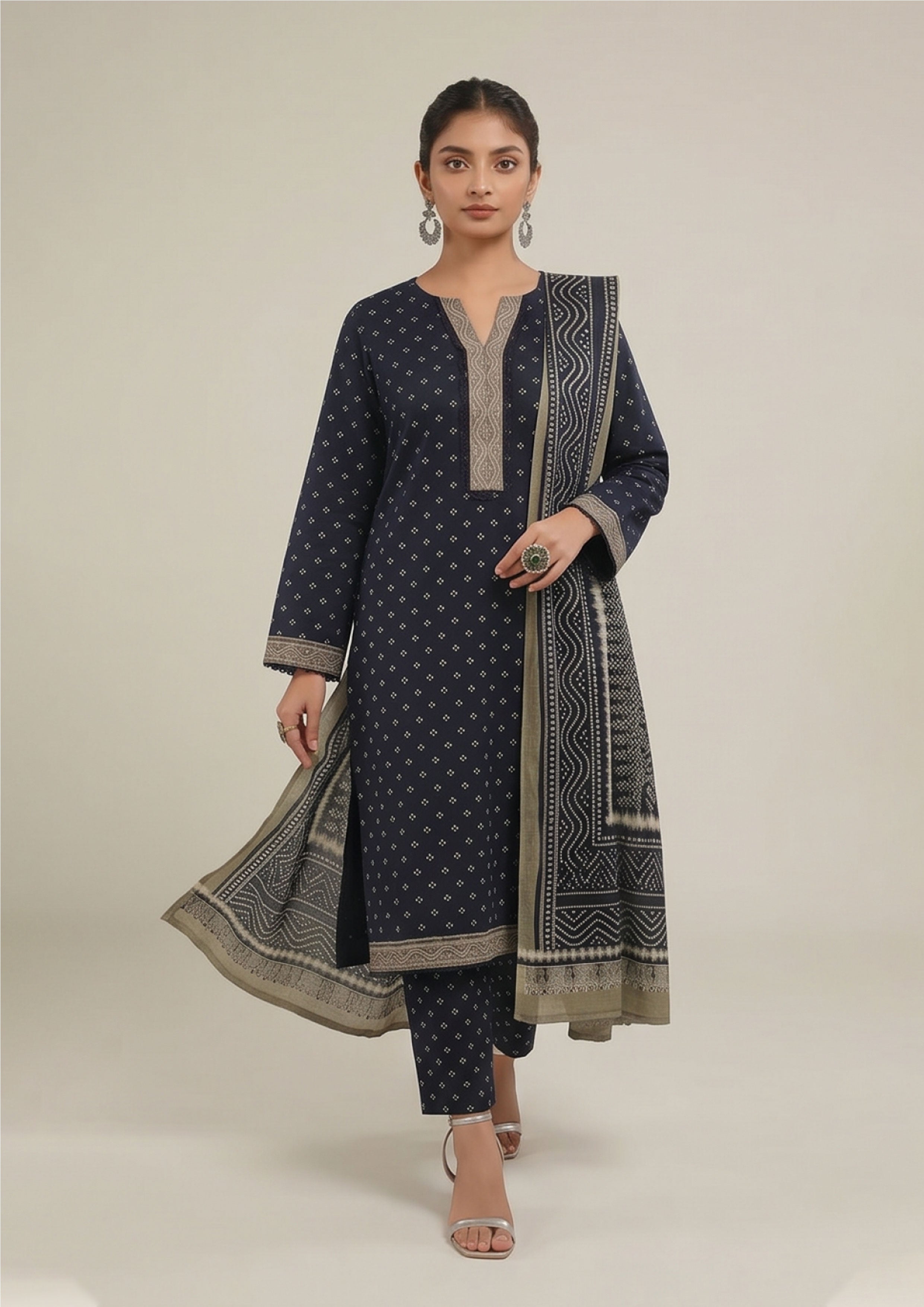 Front look of Sage Chunri Noir chunri print lawn suit with ivory micro-diamond motifs, sage placket and matching printed trouser