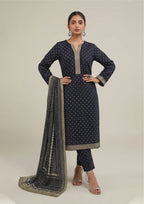 Back view of Sage Chunri Noir women stitched lawn suit showing large leheriya-style dupatta with geometric borders and sage trim