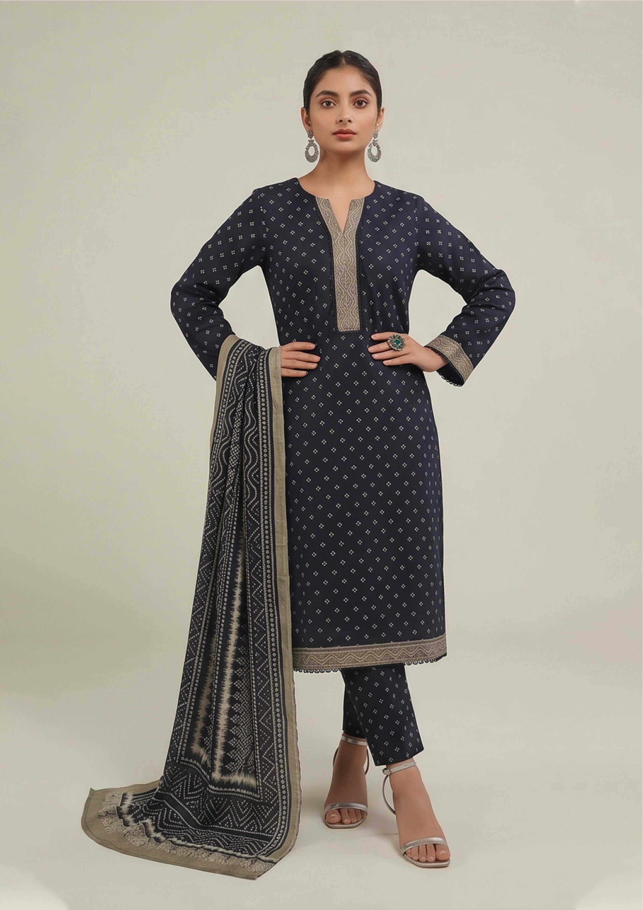 Back view of Sage Chunri Noir women stitched lawn suit showing large leheriya-style dupatta with geometric borders and sage trim