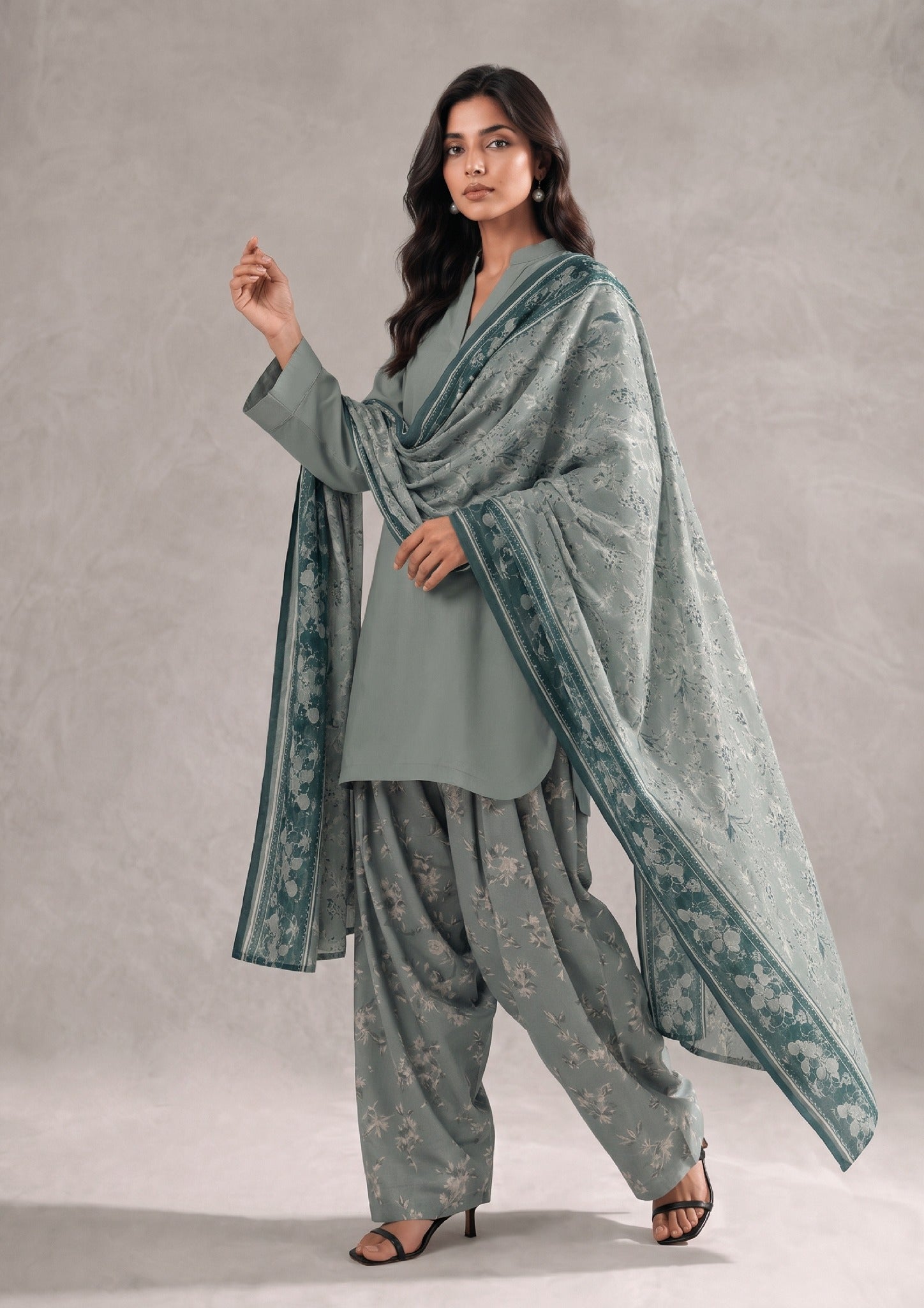 Front pose of Sage Fusion Pakistani Lawn Suit with Printed Cambric Lawn dupatta and printed trousers by Mirasl.