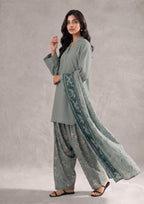 Side profile of Sage Fusion Women's Lawn Suit showcasing sage green styling and an elegant printed dupatta.