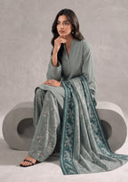 Seated view of Sage Fusion Ready to Wear Summer Lawn Suit with printed trousers and dupatta by Mirasl.