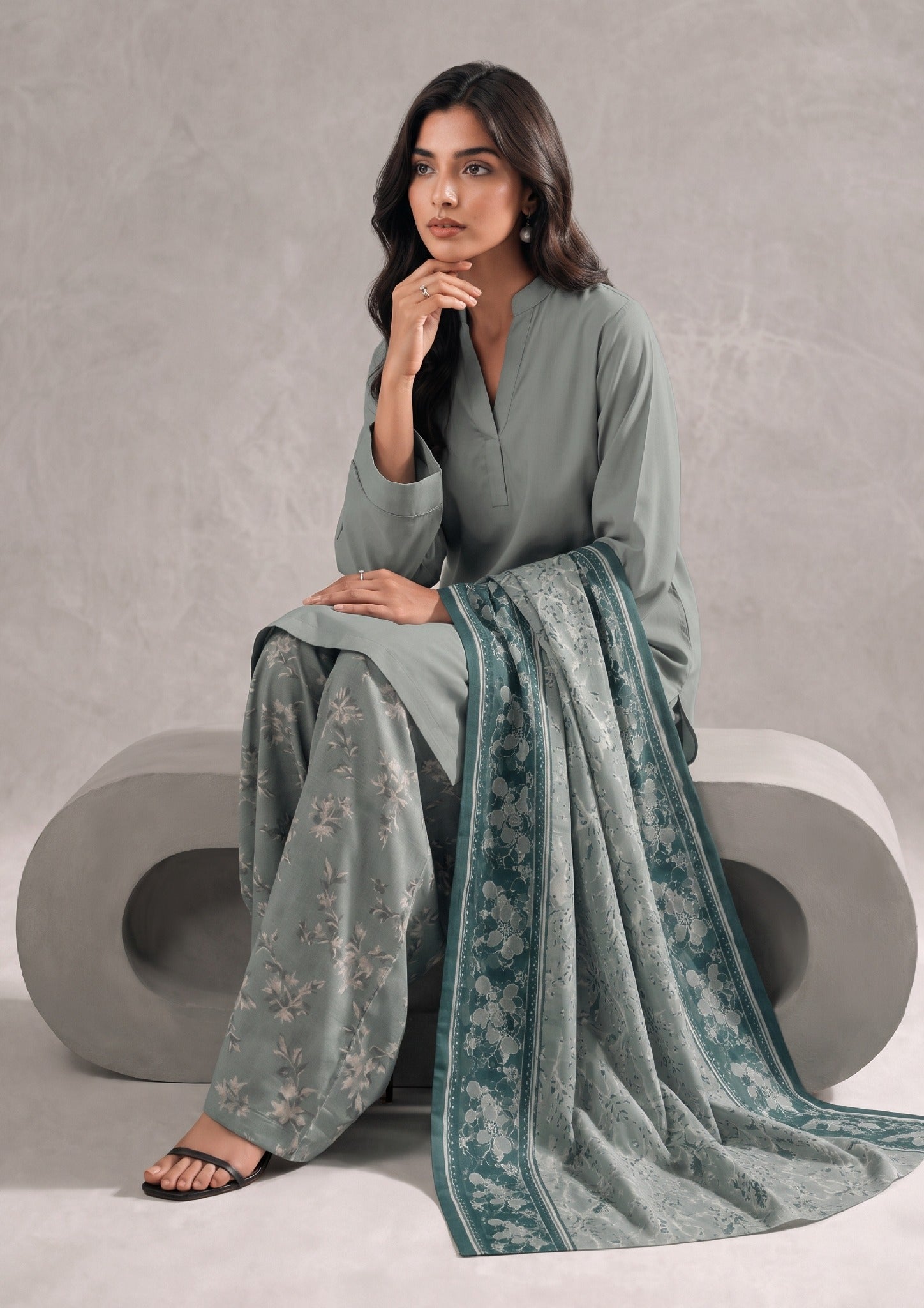 Seated view of Sage Fusion Ready to Wear Summer Lawn Suit with printed trousers and dupatta by Mirasl.