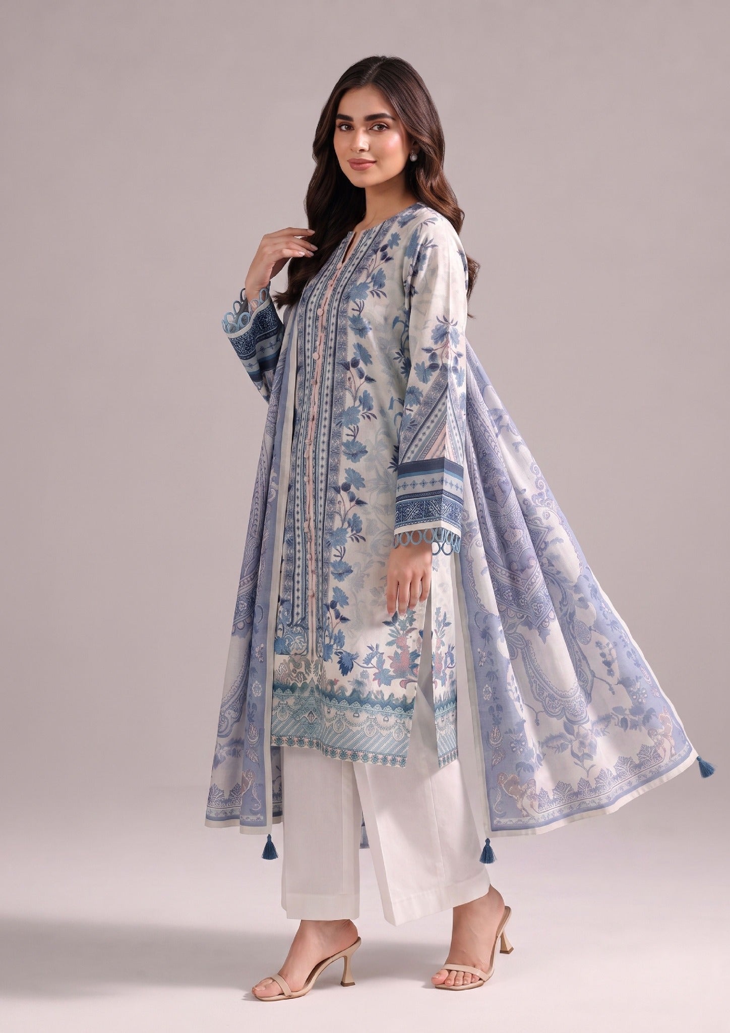 Serene Blue stitched printed lawn suit with blue printed dupatta and white straight trouser by Mirasl