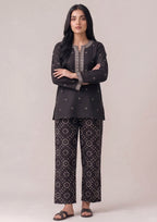 Stitched chunri print trouser for women in black by Mirasl for casual wear