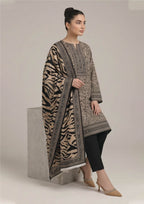 Seated front angle of Urban Safari Noir designer lawn suit with beige animal print dupatta, patterned kurta and black trouser