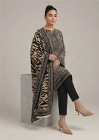 Side view of Urban Safari Noir black and sand lawn suit with flowing tiger stripe dupatta and tailored black trouser